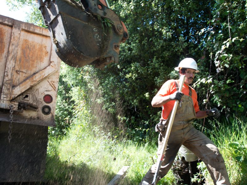 A water-main relocation project is underway in an effort to outpace the town’s crumbling bluffs.